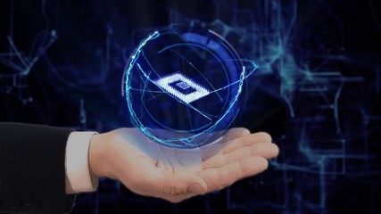 Painted hand shows concept hologram 3d Microchip on his hand. Drawn man in business suit with future technology screen and modern cosmic background