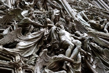 Ascension to the heaven of Jesus Christ at the door of Milan Cathedral, Italy