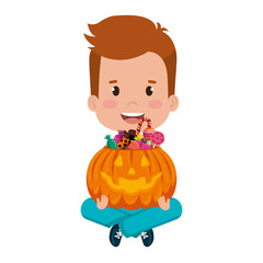 Canvas Print - little boy lifting halloween pumpkin with candies