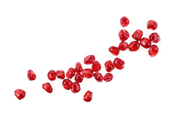 Pomegranate seeds isolated on white background. Top view.