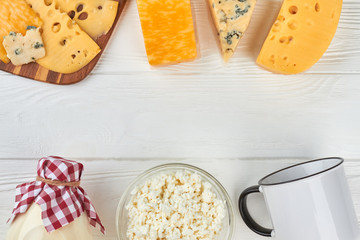 Wall Mural - Dairy products on wooden table. Frame from dairy products and copy space. Milk food for gourmet.