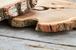 © DenisProduction.com - Wooden slices with bark. Piece of natural tree. Large wood slices for centerpieces.