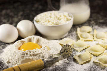 Ravioli on granite background. Home made italian pasta.