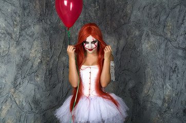 girl in clown costume	