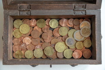 coins in a  treasure chest