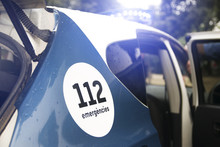 Emergency Response To The 112 Service In  Catalonia, Spain. Mossos D'Esquadra Judicial Police Car With Alarm Siren On. Empty Copy Space For Editor's Text.