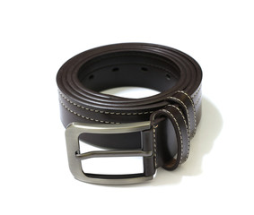 Black leather belt isolated on white background, copy space.