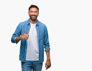 Poster - Adult hispanic man over isolated background doing happy thumbs up gesture with hand. Approving expression looking at the camera with showing success.