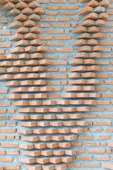 Wall Mural - abstract orange brick wall on gray cement background texture.