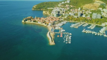 Wall Mural - Aerial beautiful panoramic view at old town in Budva. Accelerated and slow-motion footage