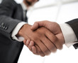 © ASDF - Close up of businessmen shaking hands business success ideas con