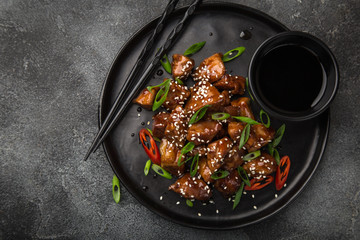 Wall Mural - sweet sticky pork served with chives and  sesame seeds