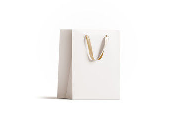 blank white paper gift bag with gold silk handle mockup, 3d rendering. empty shopping packet mock up
