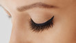 © Olesia - Female eye with extreme long false eyelashes. Eyelash extensions, make-up, cosmetics, beauty