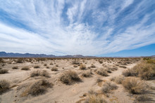 Mohave Desert Landscape With Blue Cloudy Skies
