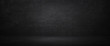 © khwanchai - Dark and black chalkboard background, empty studio room and wall