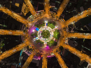 Wall Mural - Aerial view highway road 12 way circle intersection at night for transportation, distribution or traffic background.