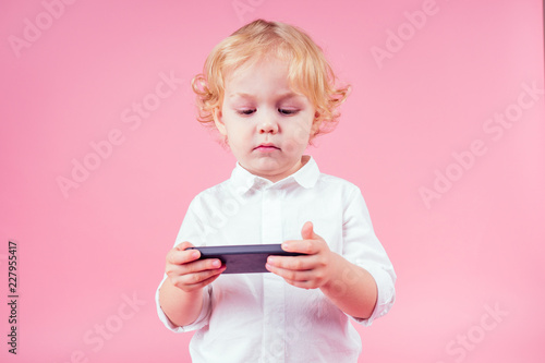 Little Boy Blond Curls Hairstyle In Business Suit Watching