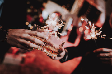 Close up. Businessmen Celebrate New Year in Office