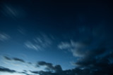 Fototapeta Na sufit - Beautiful blue dawn in the Alps mountains with clouds and stars