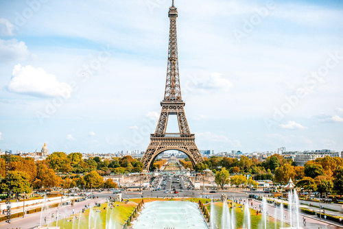 Fototapeta  View on the Eiffel tower with fountains during the daylight in Paris