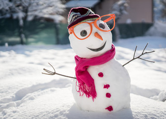 Snowman on snow background