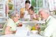 © aletia2011 - Portrait of a senior couple drinking tea at kitchen