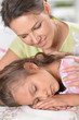 © aletia2011 - Portrait of a mother awakening daughter who sleeping at table