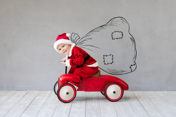 Canvas Print - Baby boy having fun on Christmas time