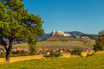 Wall Mural - The ruins of Spis Castle in eastern Slovakia, situated above the town of Spisske Podhradie and the village of Zehra