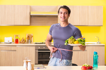 Young man in dieting and healthy eating concept