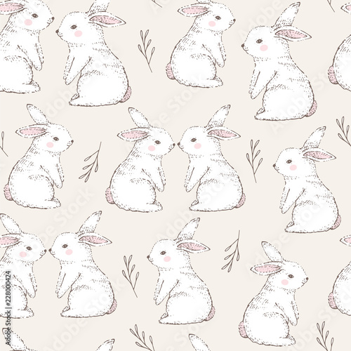 Photo Seamless pattern with cute white rabbits