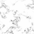 White marble background with natural stone texture.