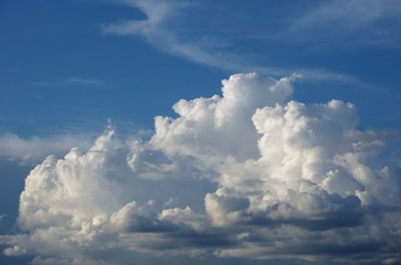 Amazing cumulus clouds and sunlight on the background of clear blue sky, Summer in GA USA.