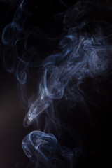 Smoke on a black background.