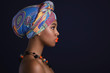 © blackday - African woman with a colorful shawl on her head