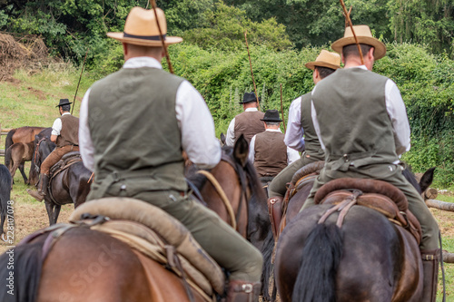 Fotografía Hunting party, horse riding in posh, elegant countryside mansion