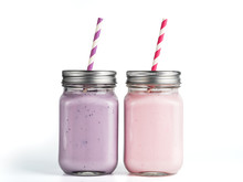 Strawberry And Blueberry Smoothie In Mason Jar Glass. Isolated On White With Clipping Path.