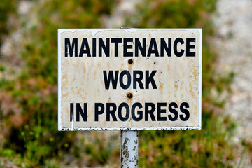 Maintenance work in progress sign board