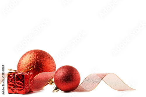 Fotografie, Obraz Christmas baubles with ribbon and gift box isolated on white