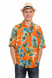 Young happy Caucasian tourist man smiling and wearing hawaiian shirt