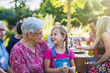 © jackfrog - Family picnic closeup on a grandmother and her granddaughter