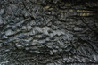 Basalt stone columns close-up on Reynisfjara black beach near  Vik town, Iceland. Texture and background.