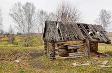 Autumn Landscape With An Old Dilapidated Wooden House