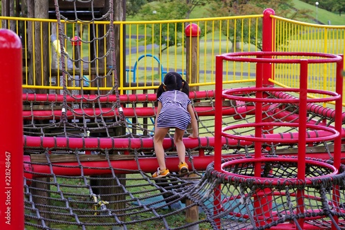 公園のアスレチック遊具で遊ぶ女の子 Buy This Stock Photo And Explore Similar Images At Adobe Stock Adobe Stock