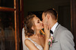 © Wedding photography - Wedding couple kissing at wedding day. Newlywed couple in love. Elegant bride and groom