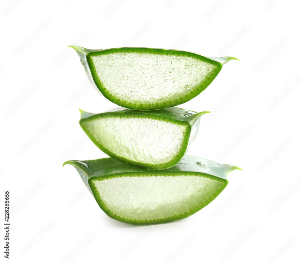 Slices of aloe vera on white background