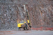 Driller in a Porphyry mine quarry.