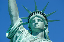 Statue Of Liberty Front Close Up On A Blue Sky Background New York City