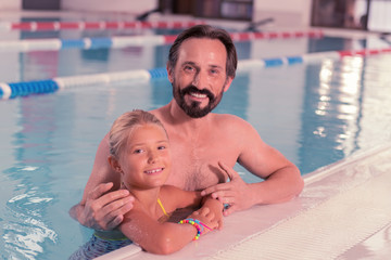 Great time. Delighted nice father and daughter smiling to you while having a great time together in the pool